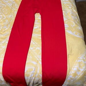 Ladies red leggings size medium
